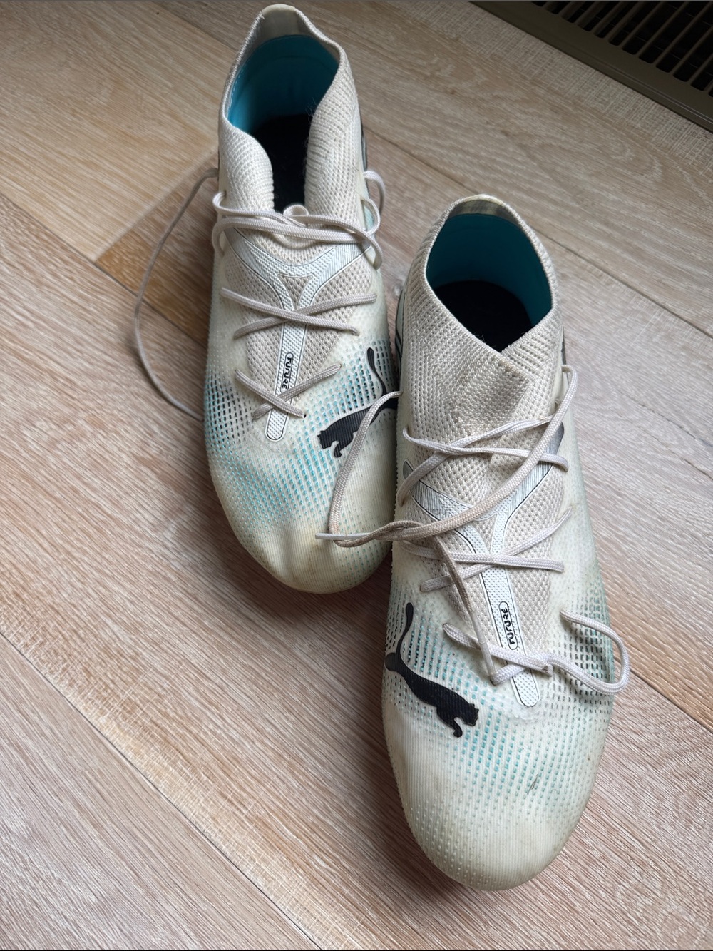 Puma Cream Athletic Soccer Cleats with Teal Interior